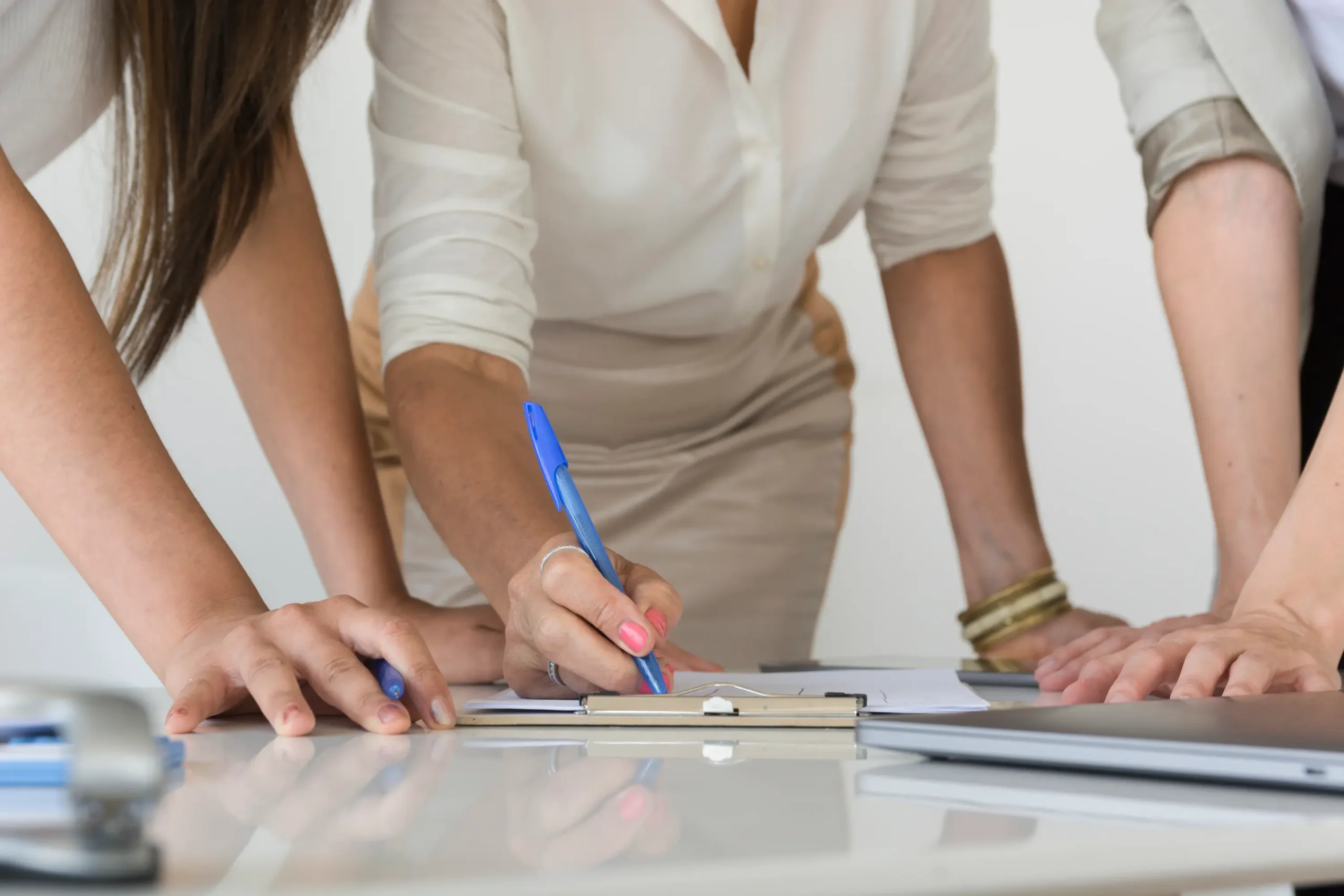 Law firm operations planning: hands working on business documents for strategy and management